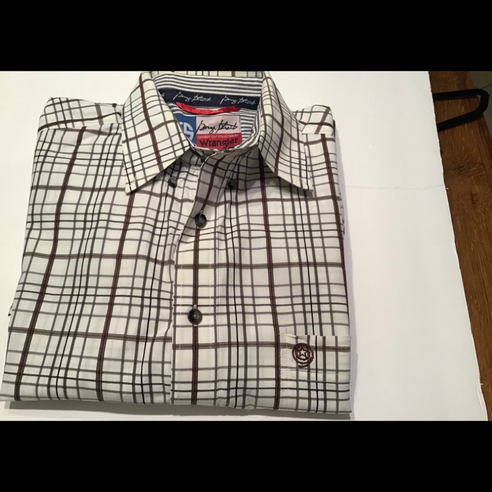 Wrangler long sleeve tan plaid shirt.